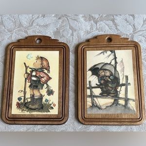 Vintage Hummel wall hangings.